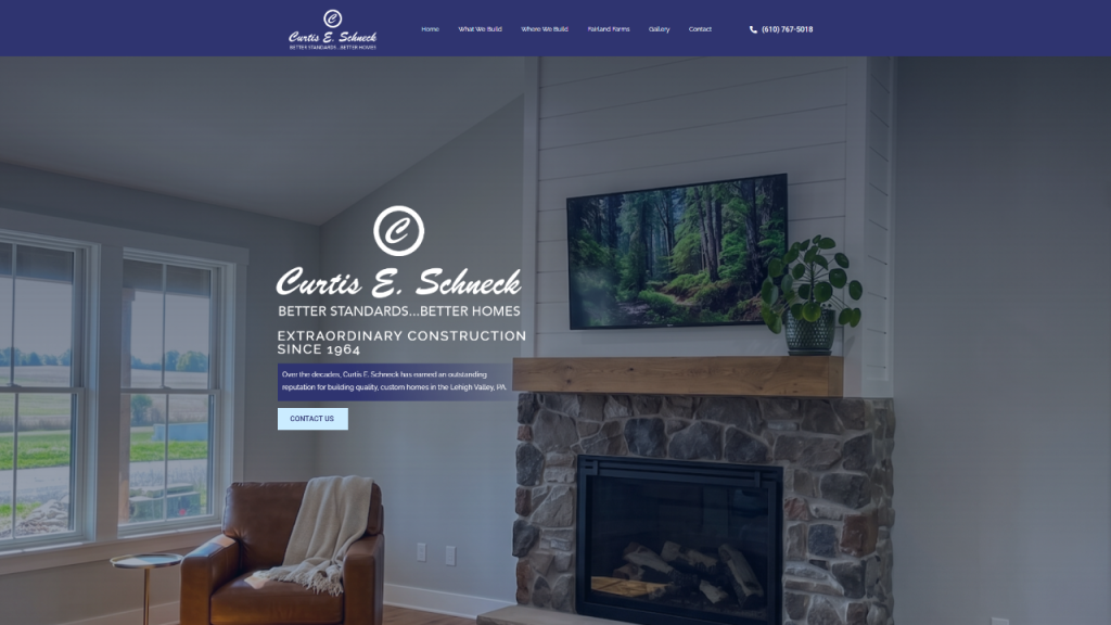 A modern living room featuring a stone fireplace and a wooden mantel. A television displaying a nature scene hangs above the mantel, and large windows provide a view of greenery outside. The design elements reflect a emphasis on responsive design.