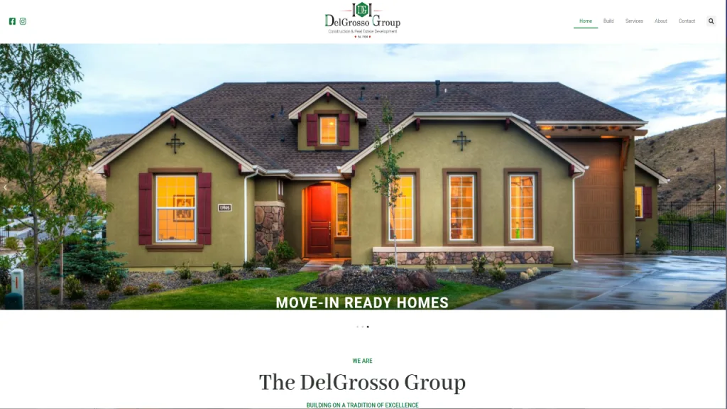 A modern single-family home with a green exterior and maroon accents features a front porch and multiple large windows. The landscaping includes grass and shrubs. This image is relevant for real estate web design, showcasing properties.